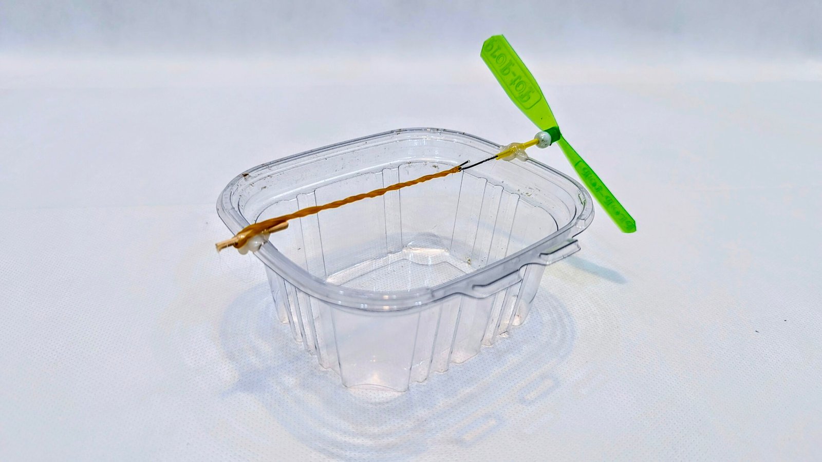 Rubber band powered fan boat